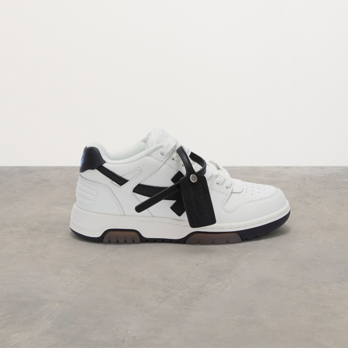 white shoes with black lines on the minimal background 